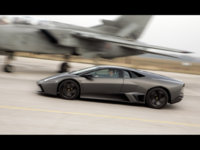 2008-Lamborghini-Reventon-vs-Tornado-Jet-Fighter-Side-Speed-Tilt-Closeup-1024x768.jpg